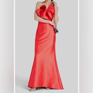 Badgley Mischka's floor-length gown showcases an oversized pinwheel bodice.